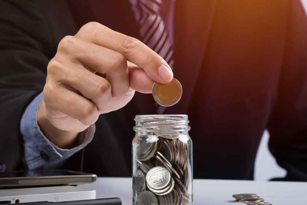 hand-putting-mix-coins-seed-clear-bottle-copyspace-business-investment-growth-concept () hand-putting-mix-coins-seed-clear-bottle-copyspace-business-investment-growth-concept ()